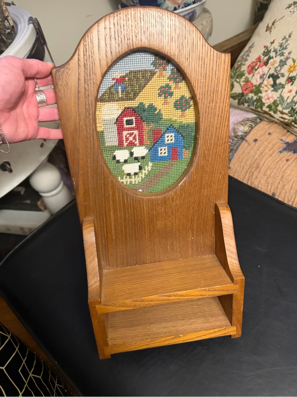 Vintage wooden wall hanging shelf with cross-stitch embroidered farmhouse scene